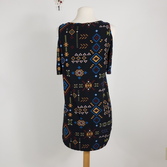 5/$12 Eye Candy Open Shoulder Tunic - Picture 2 of 9